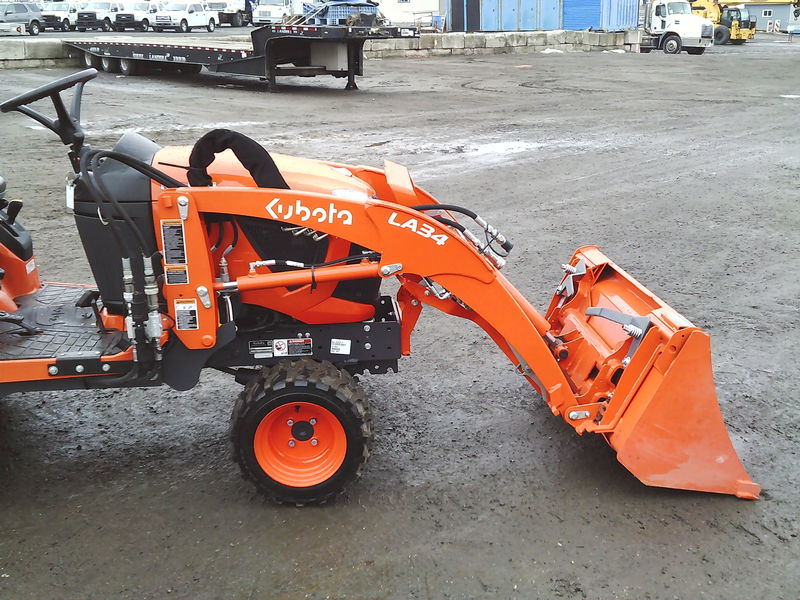 Tractors - Compact  Kubota BX23S Tractor / Backhoe Photo